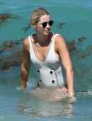 Claire Holt in One-piece Swimsuit as she takes a Dip in the Ocean in Miami