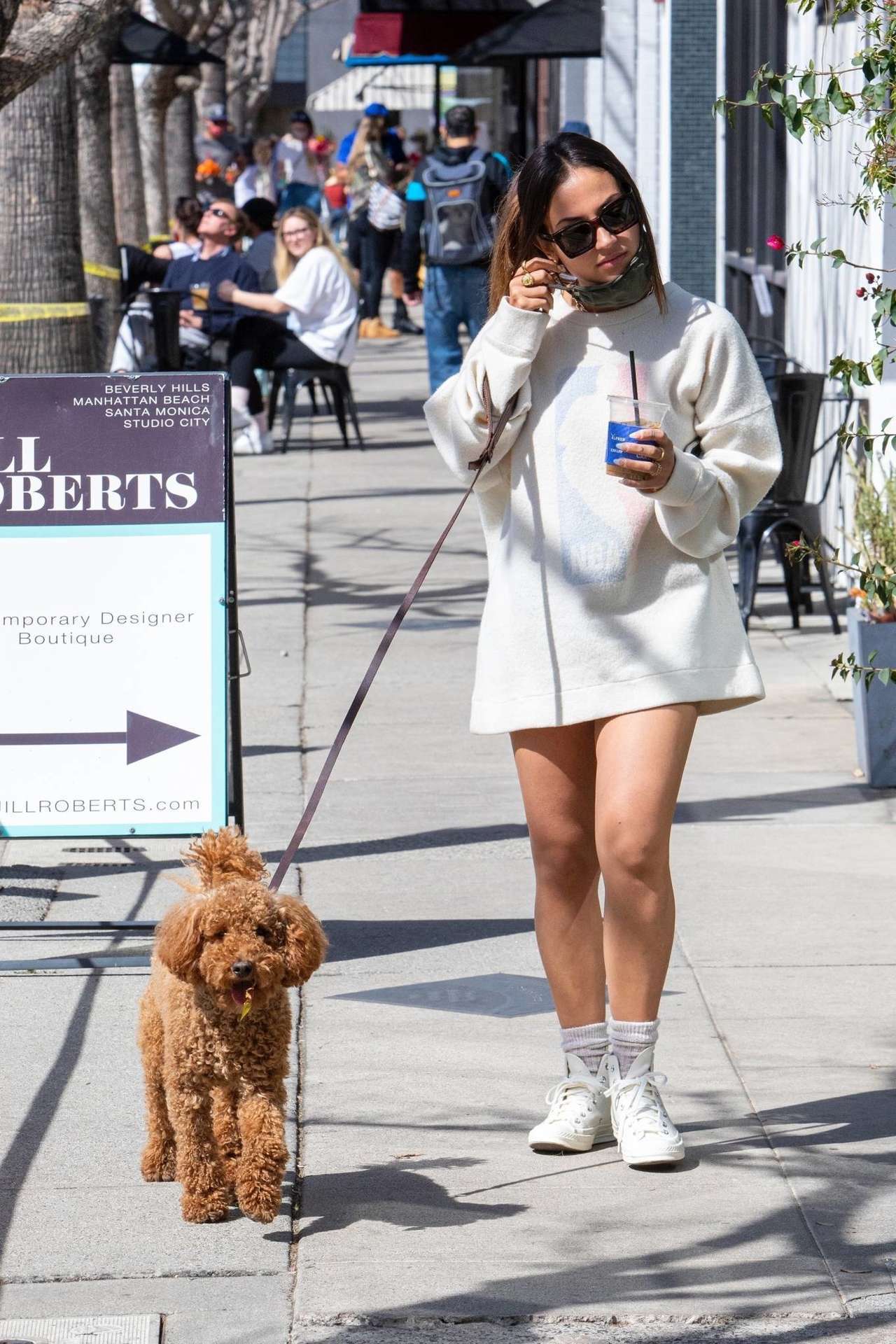 Inanna Sarkis Leggy, at Alfred’s with her Dog in Studio City
