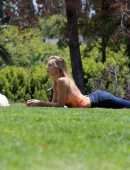 Alexis Ren Cleavage, Spotted with her Pup Angel in a Local Park in Los Angeles
