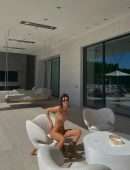 Kendall Jenner Under the Sun, Oiled up in a Tiny Bikini