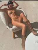 Kendall Jenner Under the Sun, Oiled up in a Tiny Bikini