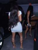 Kim Kardashian Cleavage and Leggy in a White Dress, Out in Miami