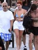 Bella Thorne in Bikini Top getting off a Yacht in Miami