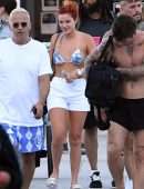 Bella Thorne in Bikini Top getting off a Yacht in Miami