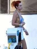 Bella Thorne in Bikini Top getting off a Yacht in Miami