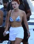 Bella Thorne in Bikini Top getting off a Yacht in Miami