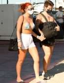 Bella Thorne in Bikini Top getting off a Yacht in Miami