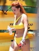 Bella Thorne Flaunts her Stunning Body and Booty in Yellow Bikini in Miami
