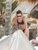 Brandi Cyrus in a Black Bikini as she hits the Beach in Mexico