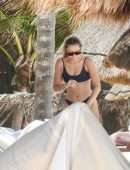 Brandi Cyrus in a Black Bikini as she hits the Beach in Mexico
