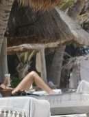 Brandi Cyrus in a Black Bikini as she hits the Beach in Mexico