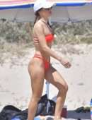 Camila Coelho Booty in Red Bikini Playing Beach Volleyball in Santa Monica