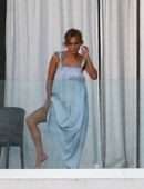 Jennifer Lopez Leggy from the Balcony of her Beach Waterfront Mansion in Miami