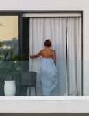 Jennifer Lopez Leggy from the Balcony of her Beach Waterfront Mansion in Miami