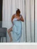 Jennifer Lopez Leggy from the Balcony of her Beach Waterfront Mansion in Miami