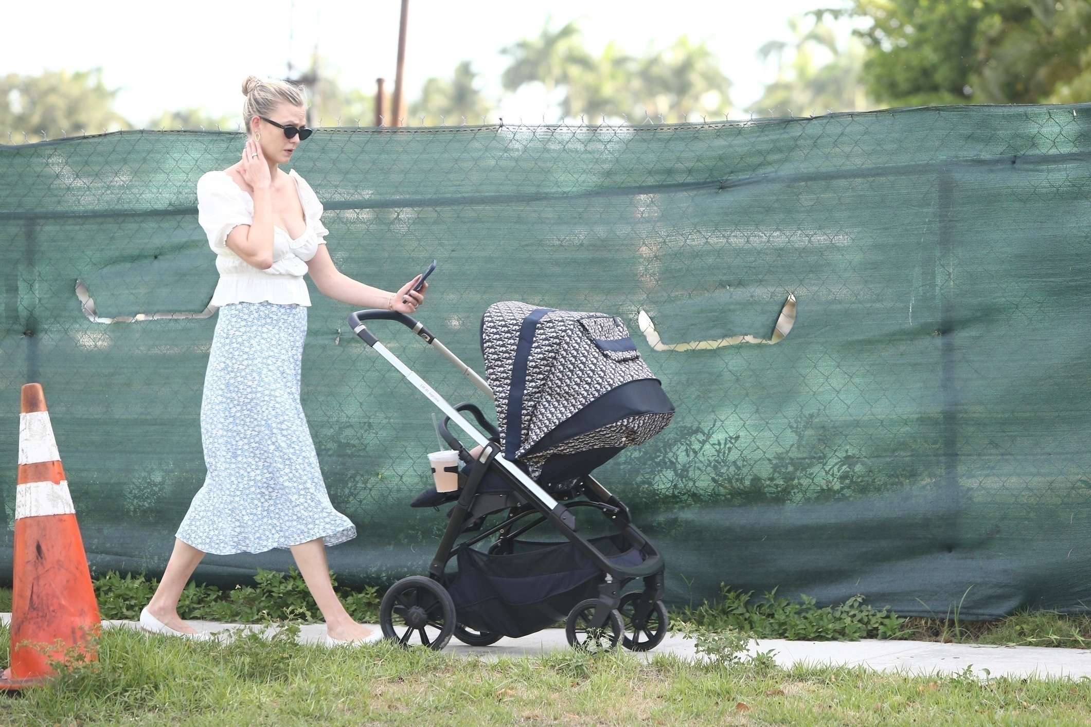Karlie Kloss Cleavage, for a Walk in Miami