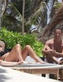 Teresa Giudice and her Boyfriend's PDA as they Passionately Kiss on a Mexican Beach