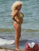 Afida Turner in a Tiny Yellow Swimsuit in Miami Beach, Florida