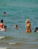 Afida Turner in a Tiny Yellow Swimsuit in Miami Beach, Florida