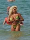 Afida Turner in a Tiny Yellow Swimsuit in Miami Beach, Florida