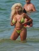 Afida Turner in a Tiny Yellow Swimsuit in Miami Beach, Florida