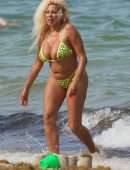 Afida Turner in a Tiny Yellow Swimsuit in Miami Beach, Florida