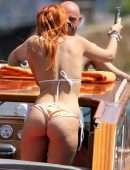 Bella Thorne Booty in Orange Bikini on Lake Como in Italy