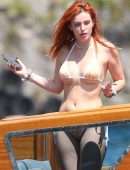 Bella Thorne Booty in Orange Bikini on Lake Como in Italy