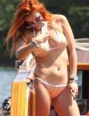 Bella Thorne Booty in Orange Bikini on Lake Como in Italy
