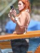 Bella Thorne Booty in Orange Bikini on Lake Como in Italy