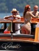 Bella Thorne Booty in Orange Bikini on Lake Como in Italy
