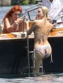 Bella Thorne Booty in Orange Bikini on Lake Como in Italy