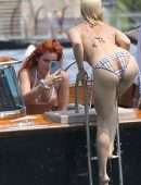 Bella Thorne Booty in Orange Bikini on Lake Como in Italy