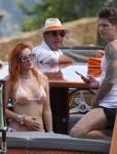 Bella Thorne Booty in Orange Bikini on Lake Como in Italy