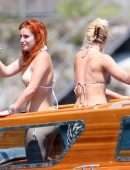 Bella Thorne Booty in Orange Bikini on Lake Como in Italy