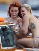 Bella Thorne Booty in Orange Bikini on Lake Como in Italy