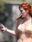 Bella Thorne Booty in Orange Bikini on Lake Como in Italy