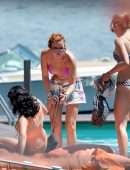 Bella Thorne Cleavage in Bikini Top in Lake Como