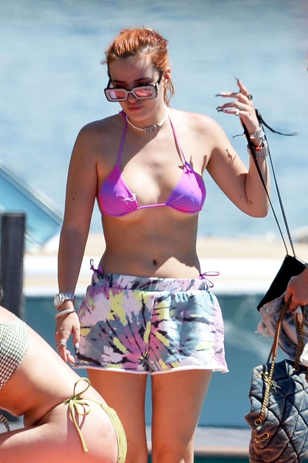 Bella Thorne Cleavage in Bikini Top in Lake Como