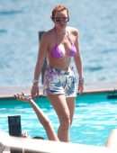 Bella Thorne Cleavage in Bikini Top in Lake Como