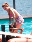 Bella Thorne Cleavage in Bikini Top in Lake Como