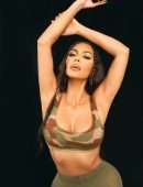 Kim Kardashian Cleavage in a Tight Camouflage Dress