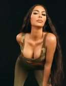 Kim Kardashian Cleavage in a Tight Camouflage Dress