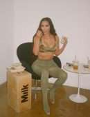 Kim Kardashian Cleavage in a Tight Camouflage Dress