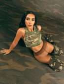 Kim Kardashian Cleavage in a Tight Camouflage Dress