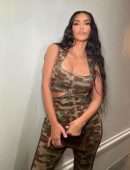Kim Kardashian Cleavage in a Tight Camouflage Dress