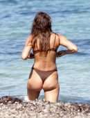 Irina Shayk Cleavage and Booty in a Thong Bikini on a Beach in Ibiza