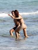 Irina Shayk Cleavage and Booty in a Thong Bikini on a Beach in Ibiza