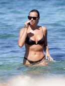 Irina Shayk Cleavage and Booty in a Thong Bikini on a Beach in Ibiza