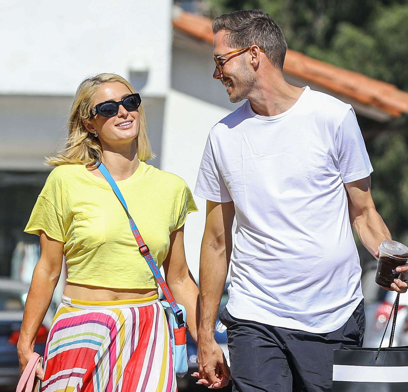 Paris Hilton "Pokies" in Yellow tshirt Out in Malibu